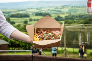 An image of pulled pork, slaw and fries with the glorious view you can enjoy whilst you're eating behind.